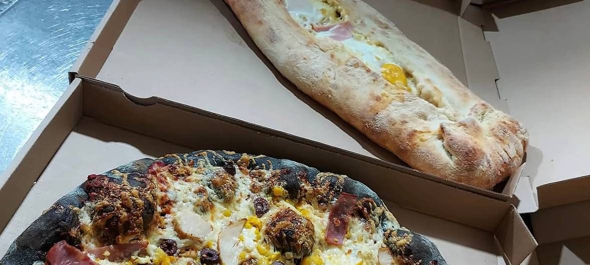 Schwarze Pizza und britische Teekultur - neue Restaurants im RSG-Land