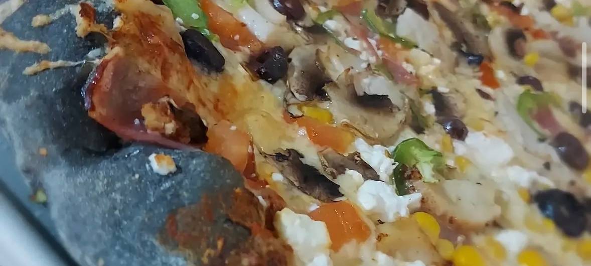 Schwarze Pizza und britische Teekultur - neue Restaurants im RSG-Land